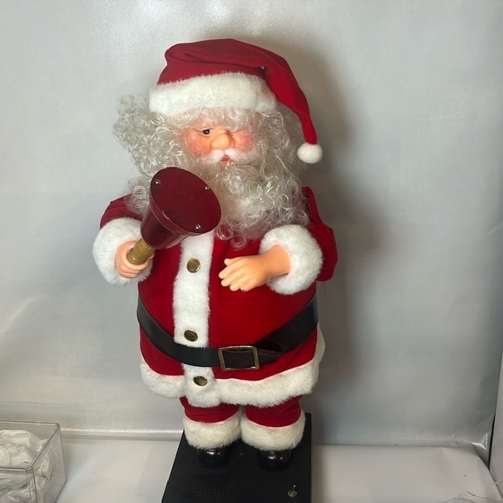 Vintage Motion-ettes Santa holding a light up bell‎ and motion head movement.